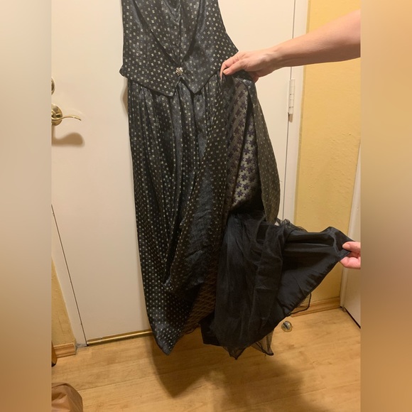 Black gown with gold and purple details. - Picture 8 of 8